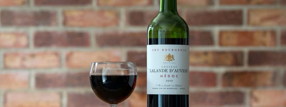 Red wine glass and red wine bottle